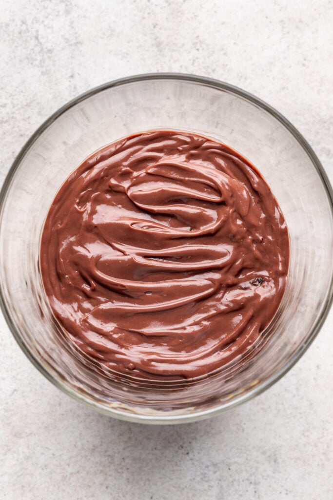 chocolate pudding in the bottom of a trifle dish