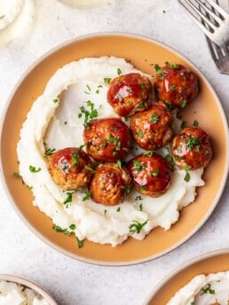 meatballs on a plate with mashed potatoes