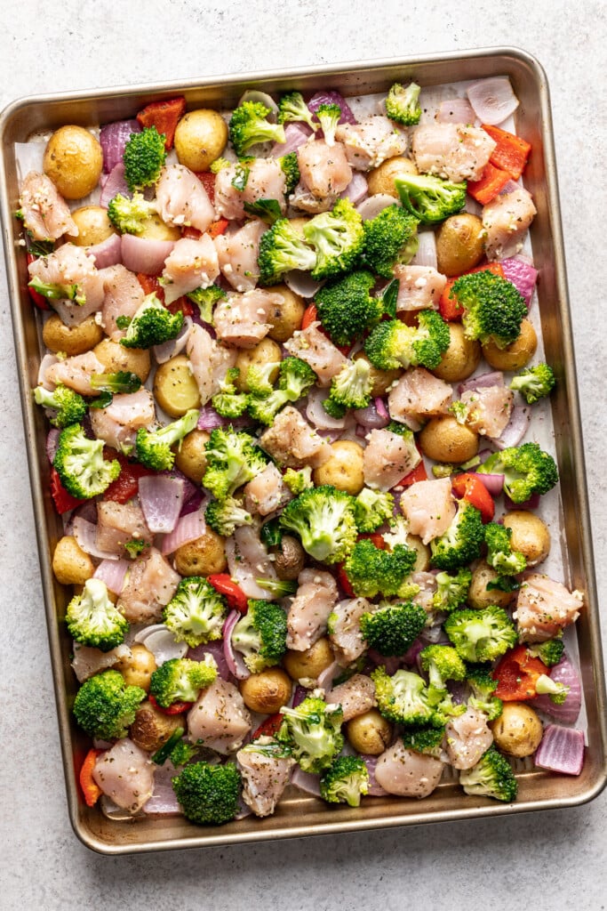 chicken and veggies on a sheet pan