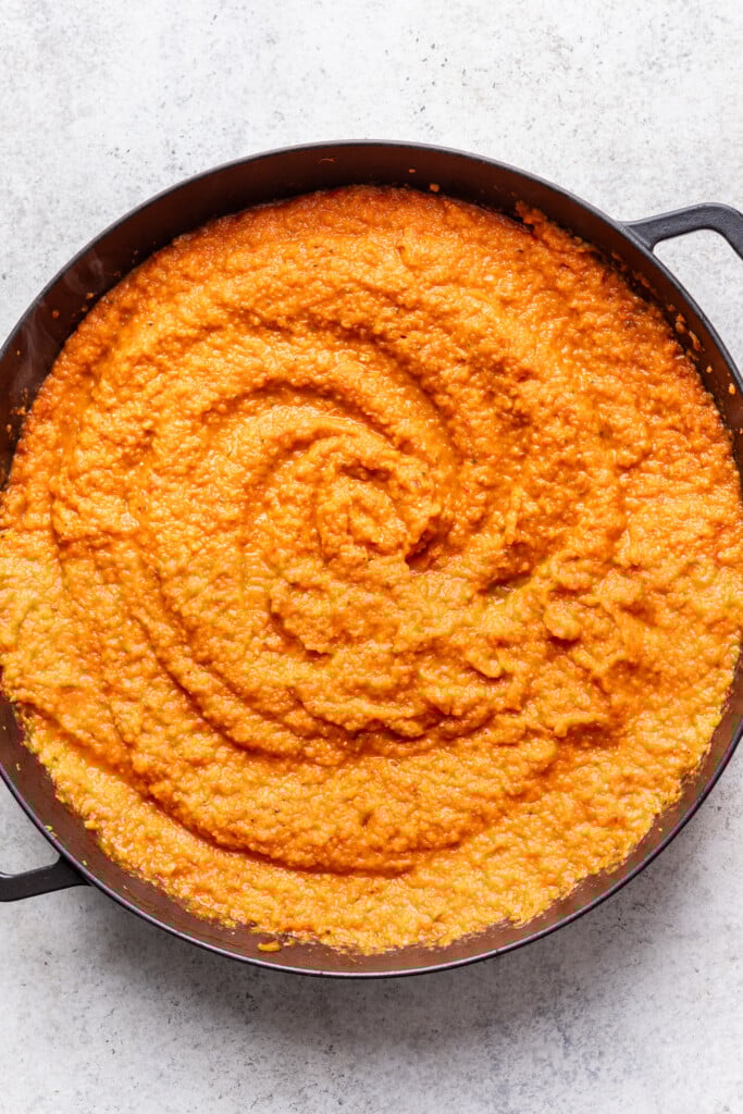 A pan filled with a thick sauce