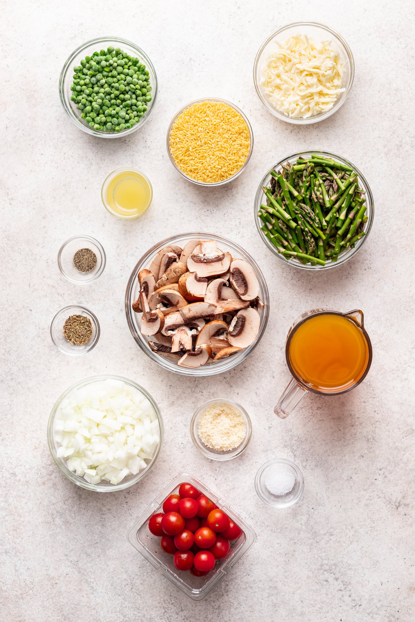 bowls of ingredients on a grey background