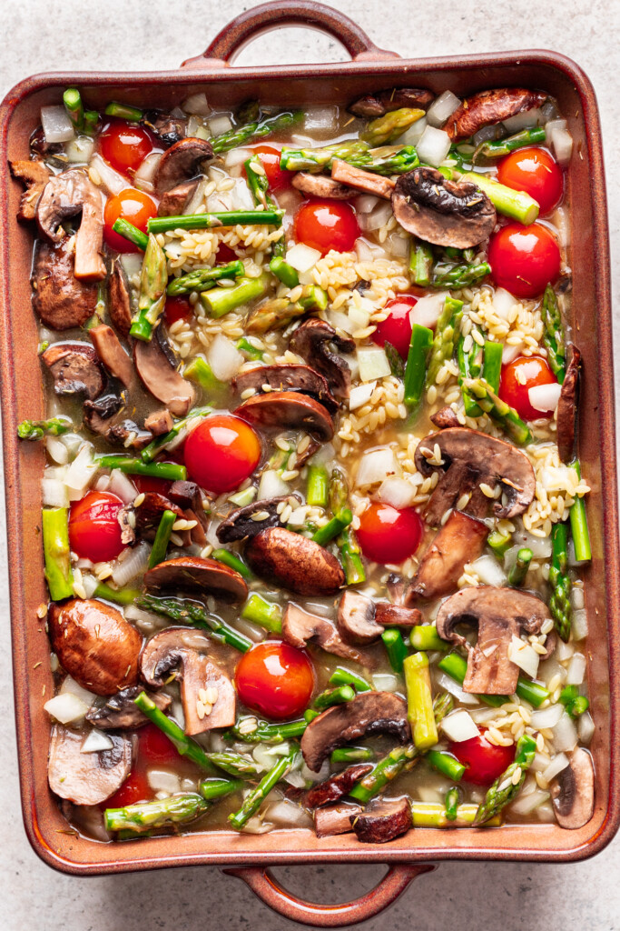 veggies in a baking dish with orzo