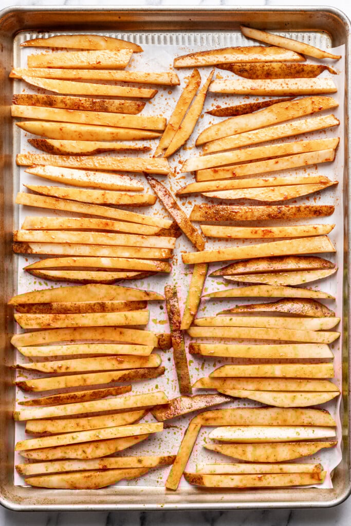 fries seasoned with spices, baked on a baking sheet