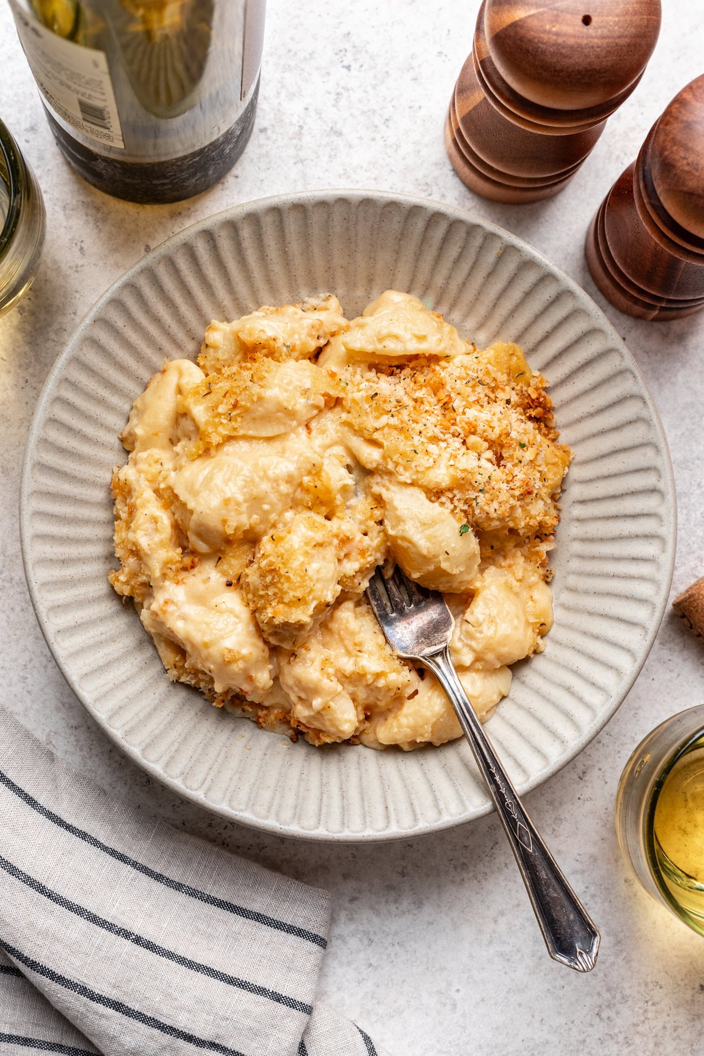 bowl of butternut squash mac n cheese with a fork