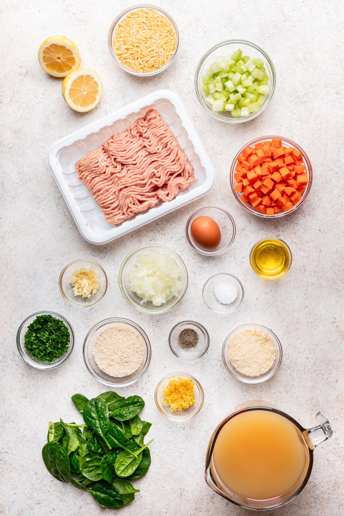 bowls of ingredients on a grey background