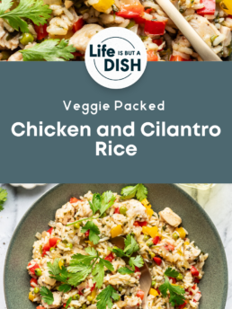 Top view of a bowl filled with rice, chopped chicken, bell peppers, peas, and fresh cilantro, placed next to a gold fork. Text reads: “Veggie Packed Chicken and Cilantro Rice.”.